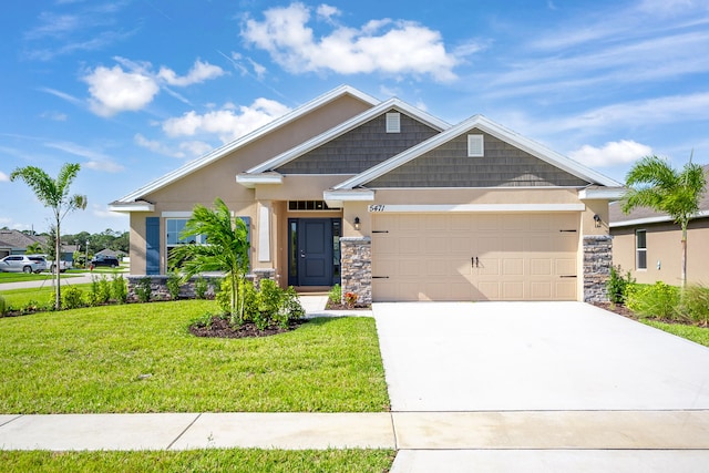 craftsman-style house with a garage and a front lawn