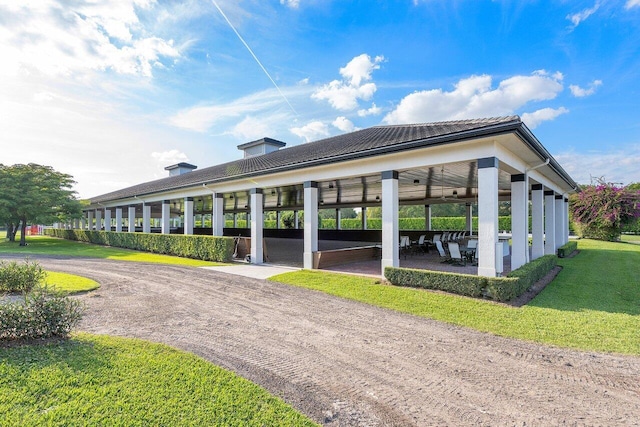 exterior space featuring a gazebo and a yard