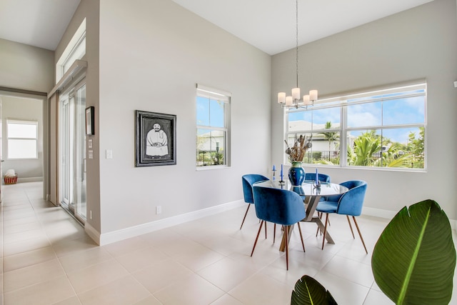 tiled dining area with a notable chandelier