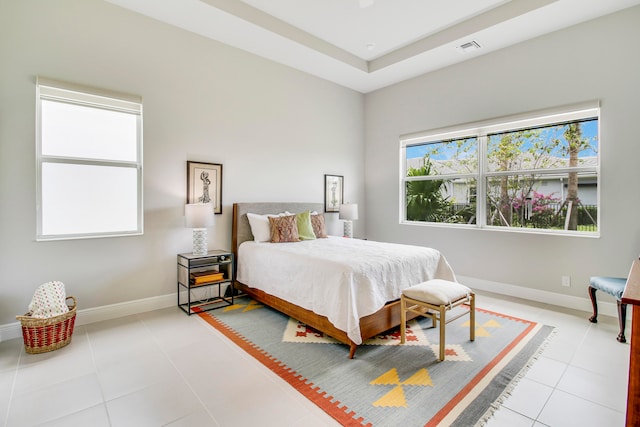 bedroom featuring light tile patterned flooring