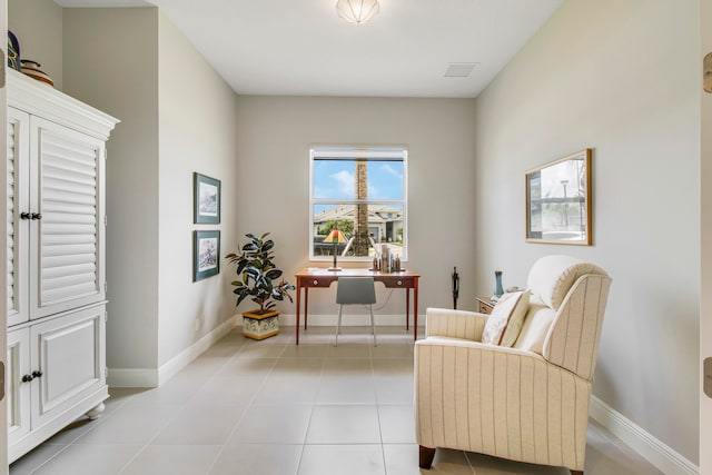 sitting room featuring light tile patterned floors