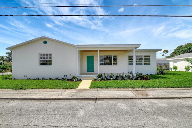 view of front facade with a front lawn