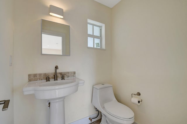 bathroom featuring toilet