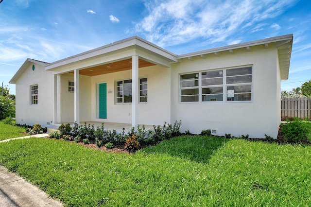 view of front of home with a front yard