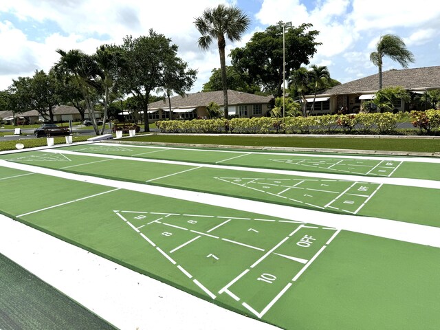 view of community featuring shuffleboard