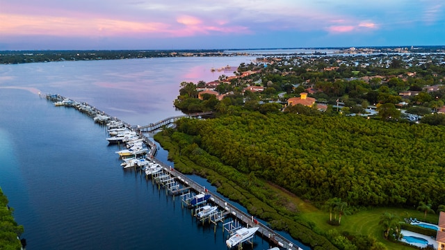 aerial view at dusk with a water view