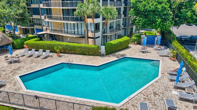 view of swimming pool featuring a patio area