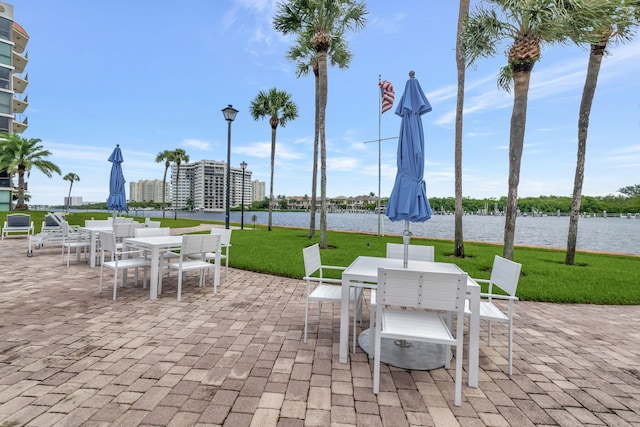 view of patio featuring a water view