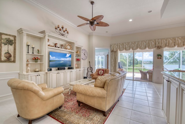 living room with ceiling fan, light tile patterned flooring, and crown molding