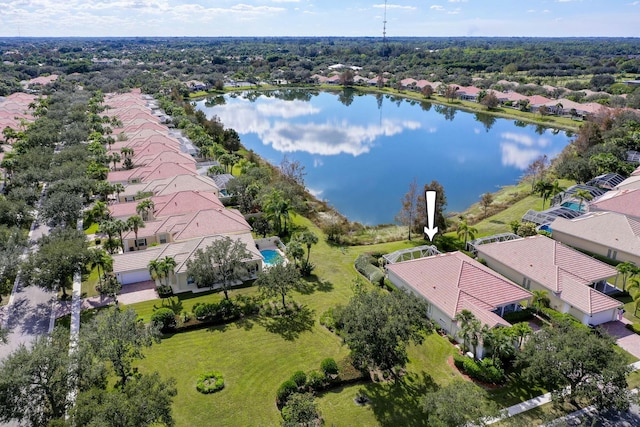 drone / aerial view with a water view