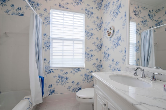 full bathroom featuring tile patterned floors, shower / tub combo with curtain, vanity, and toilet