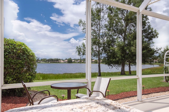 sunroom with a water view