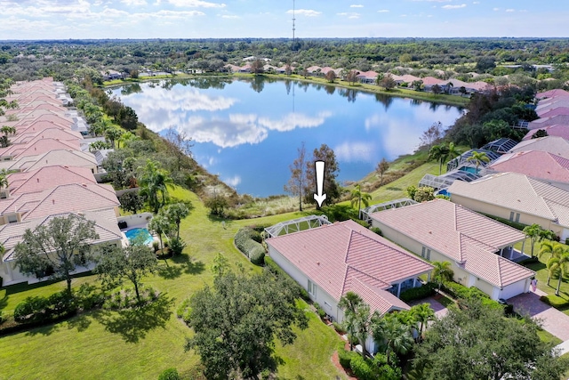 birds eye view of property featuring a water view