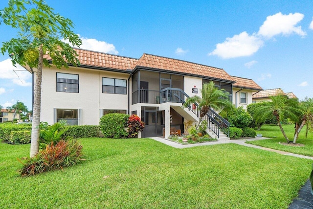 view of front of home with a front yard