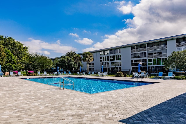 view of pool with a patio area