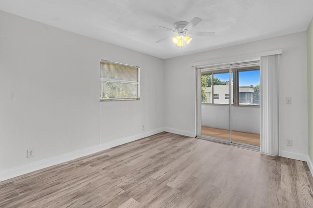 unfurnished room featuring ceiling fan and light hardwood / wood-style flooring