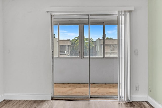 interior space with hardwood / wood-style flooring