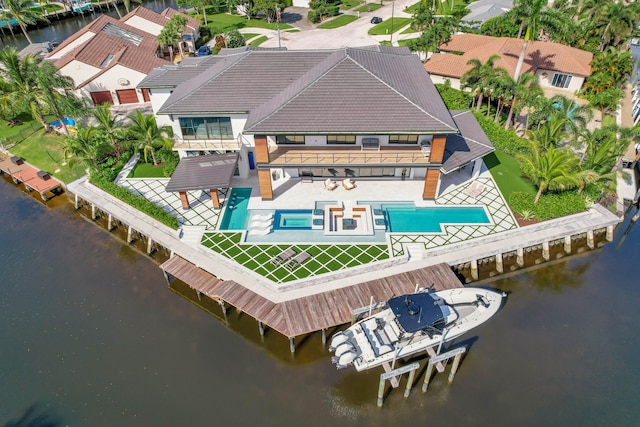 bird's eye view with a water view