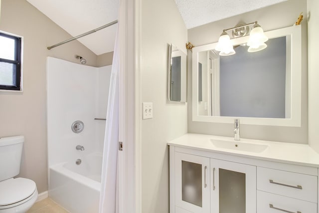 bathroom featuring a textured ceiling, toilet, vanity,  shower combination, and tile patterned floors