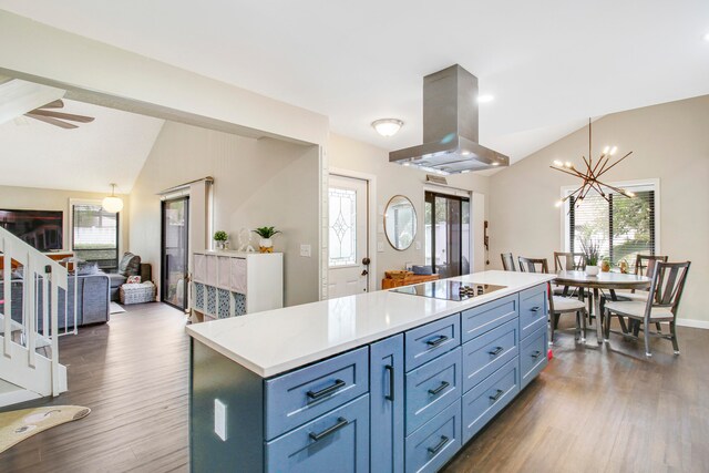 kitchen with vaulted ceiling, black electric cooktop, dark hardwood / wood-style flooring, and island range hood