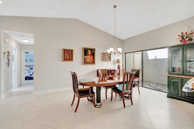 dining area with vaulted ceiling, a chandelier, and light tile patterned flooring