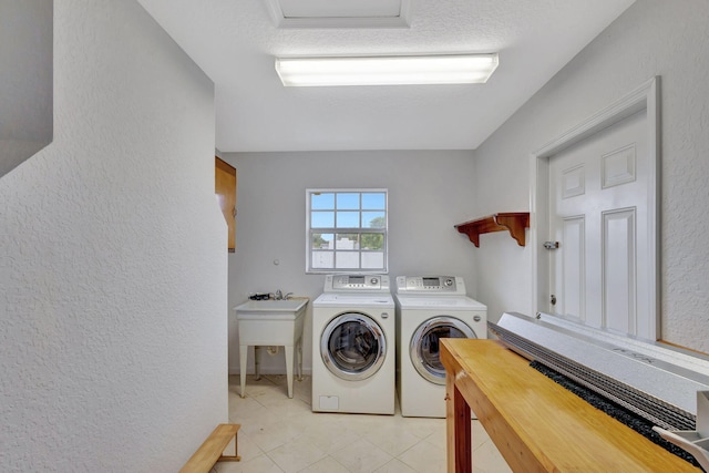 washroom featuring washing machine and dryer