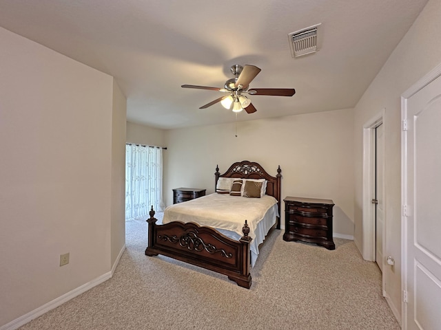 bedroom with carpet, baseboards, visible vents, and ceiling fan