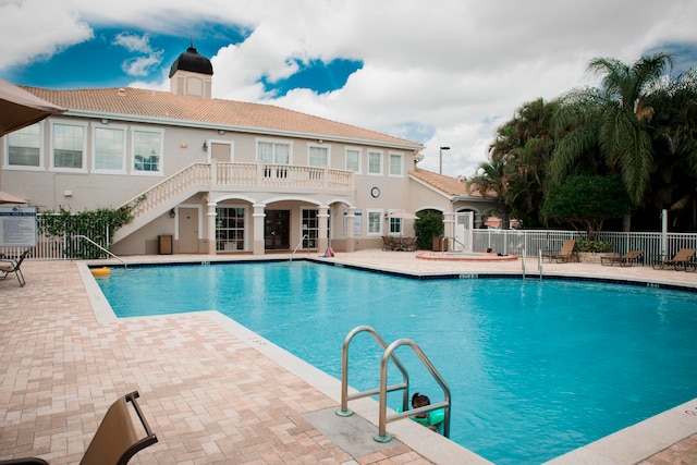 view of pool featuring a patio area