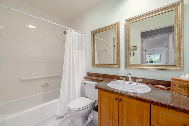 full bathroom with tile patterned flooring, vanity, toilet, and shower / bath combo with shower curtain