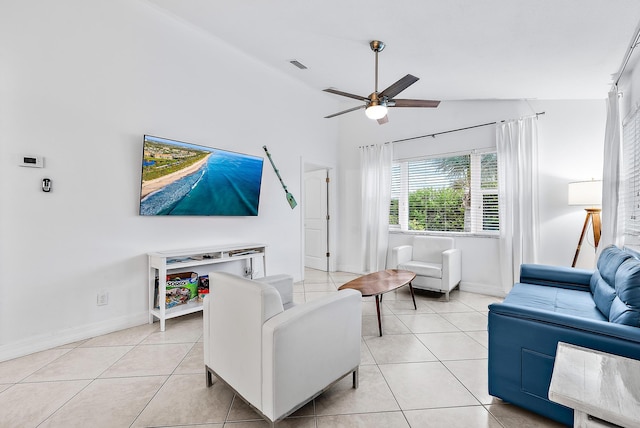 living room featuring lofted ceiling, light tile patterned flooring, and ceiling fan