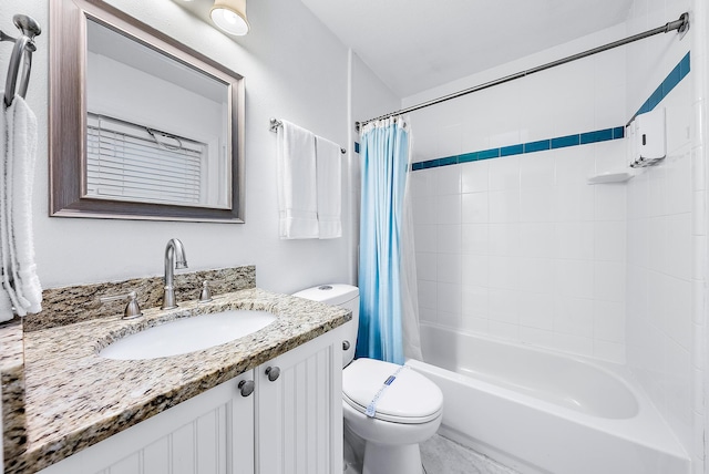 full bathroom featuring toilet, shower / tub combo, and vanity