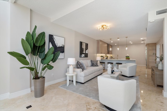 living room with a textured ceiling