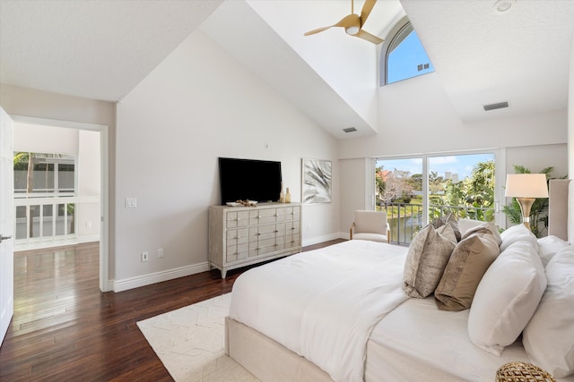 bedroom with access to exterior, high vaulted ceiling, dark hardwood / wood-style flooring, and ceiling fan