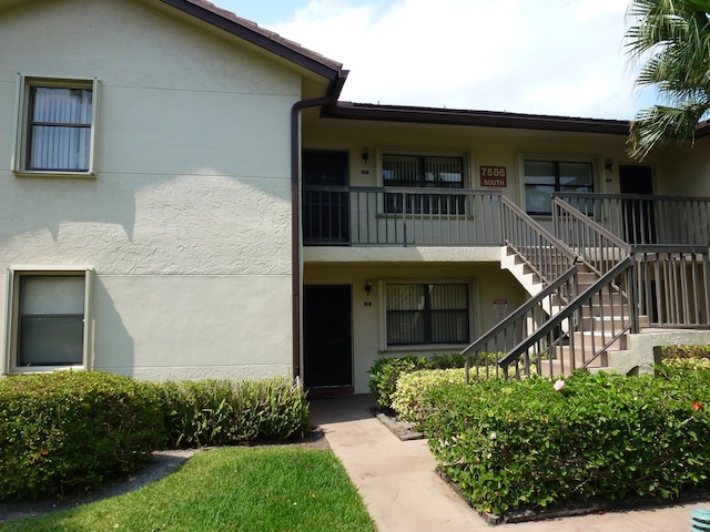 view of building exterior featuring stairway