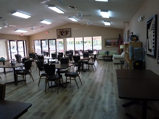 dining room with plenty of natural light, visible vents, and wood finished floors