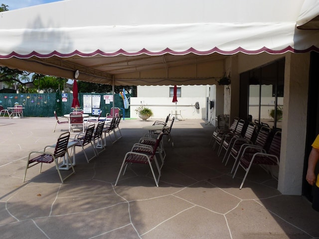 view of patio / terrace with fence