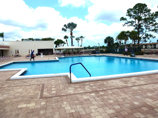 view of pool featuring a patio