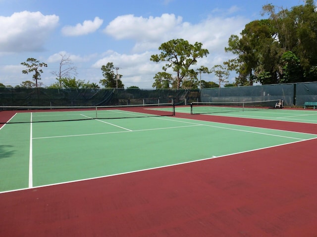 view of sport court with community basketball court and fence