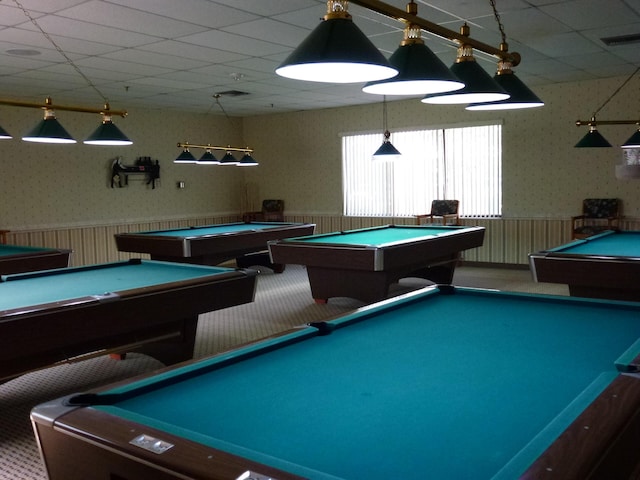 game room featuring wallpapered walls, billiards, a drop ceiling, a wainscoted wall, and carpet flooring