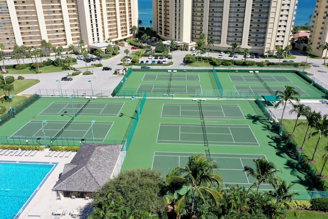 birds eye view of property with a water view