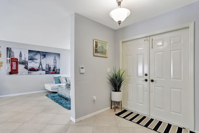 entrance foyer with light tile patterned flooring