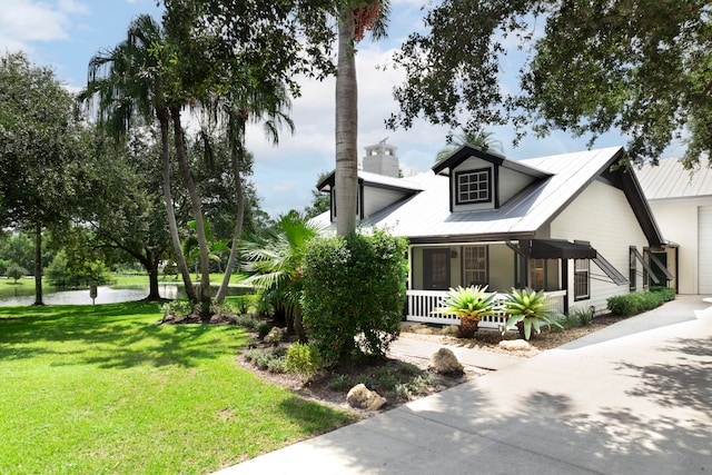 exterior space featuring a front yard and a porch