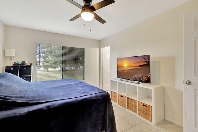 bedroom featuring ceiling fan and light tile patterned floors