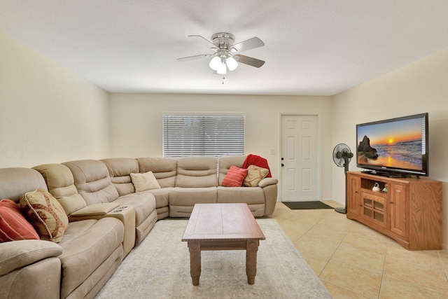 tiled living room with ceiling fan