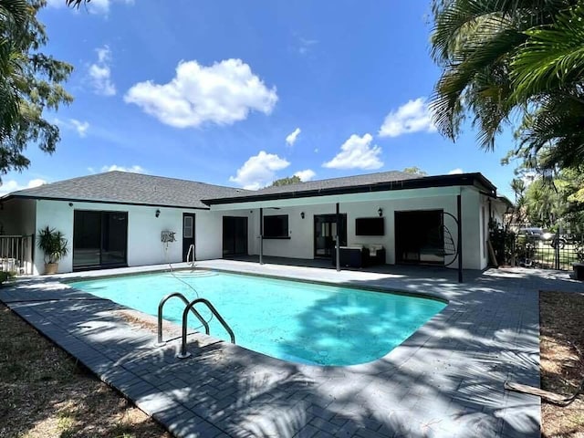 view of pool featuring a patio