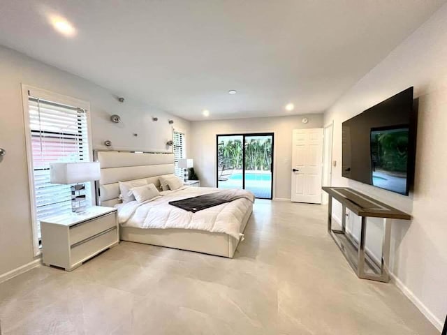 tiled bedroom featuring access to exterior