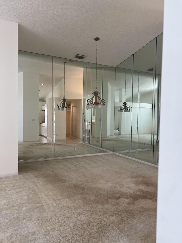 interior space with a textured ceiling