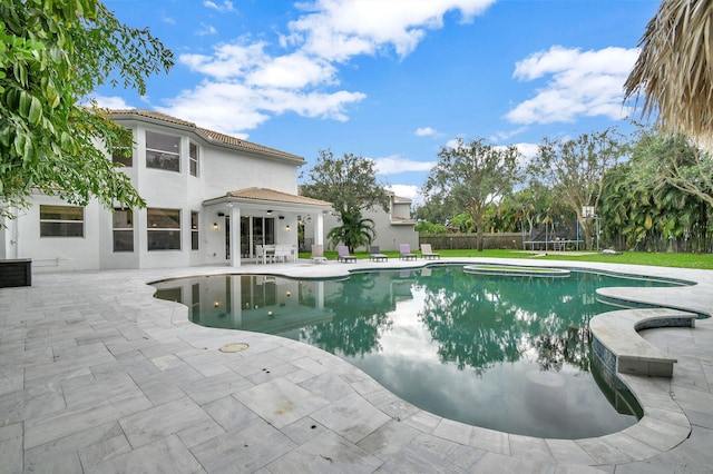 view of swimming pool featuring a patio