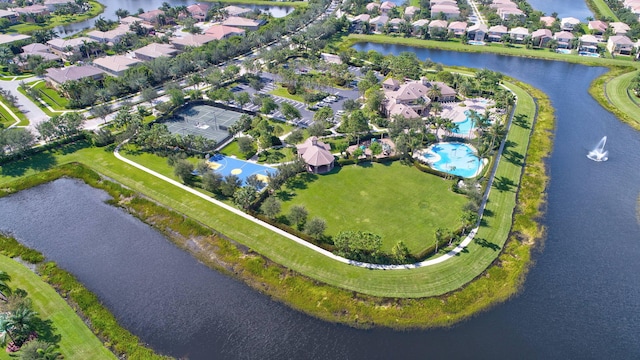 birds eye view of property featuring a water view