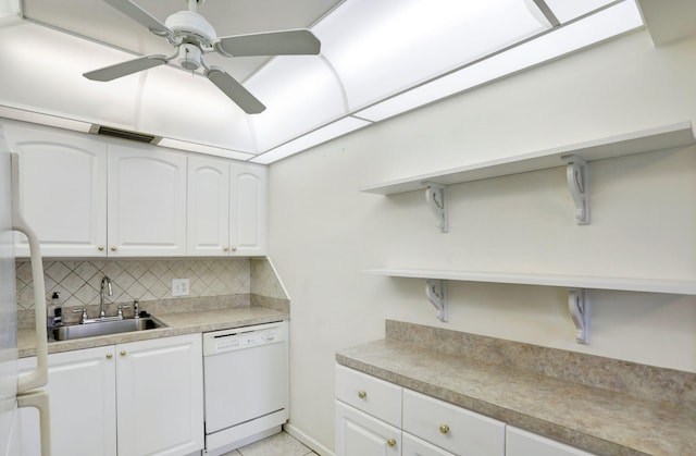 kitchen with white cabinets, dishwasher, ceiling fan, and backsplash